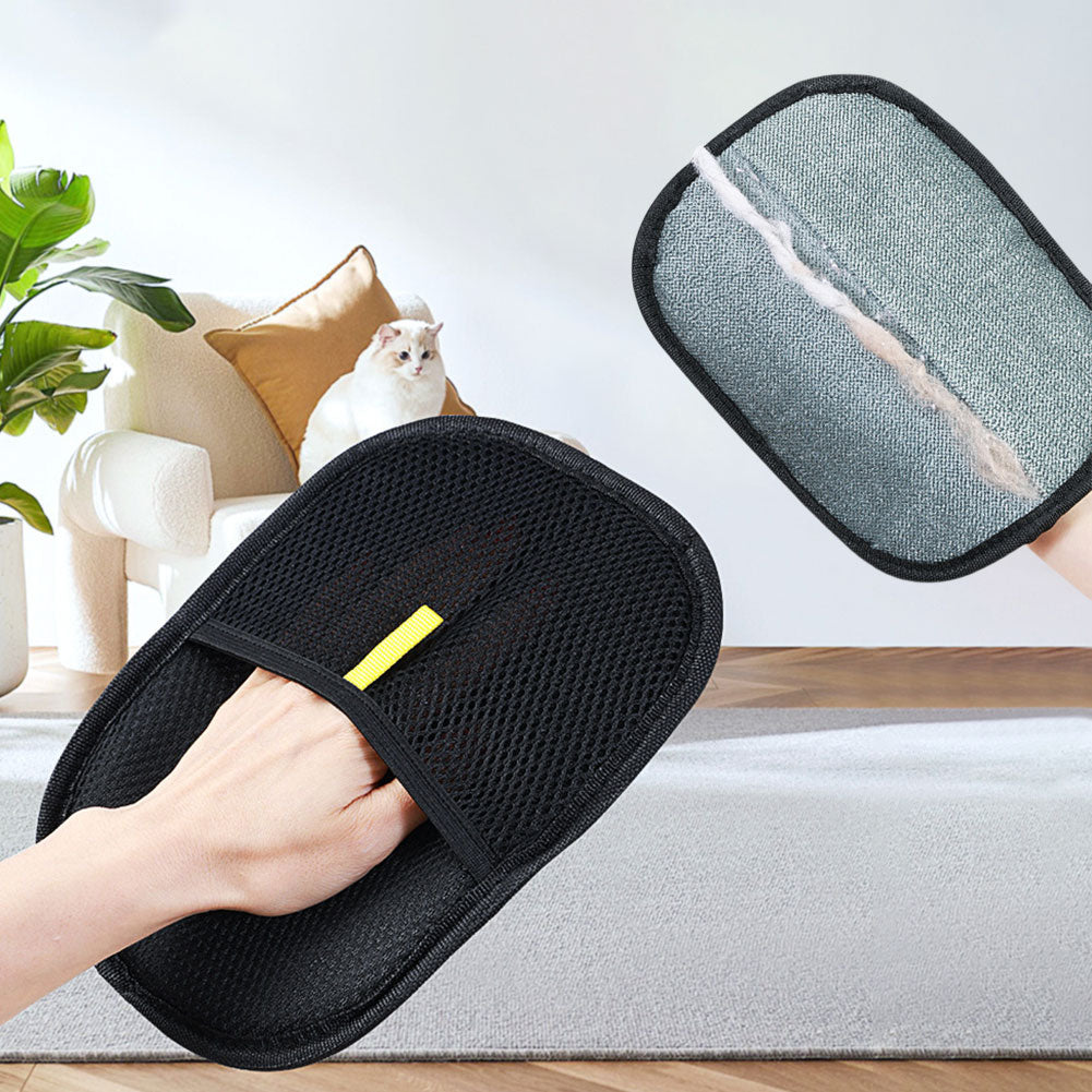 Grooming pet fur with GentlePaw glove on couch